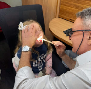 Dr Simon Braham Checking a female girl patient Dr Simon Braham Checking a female girl patient